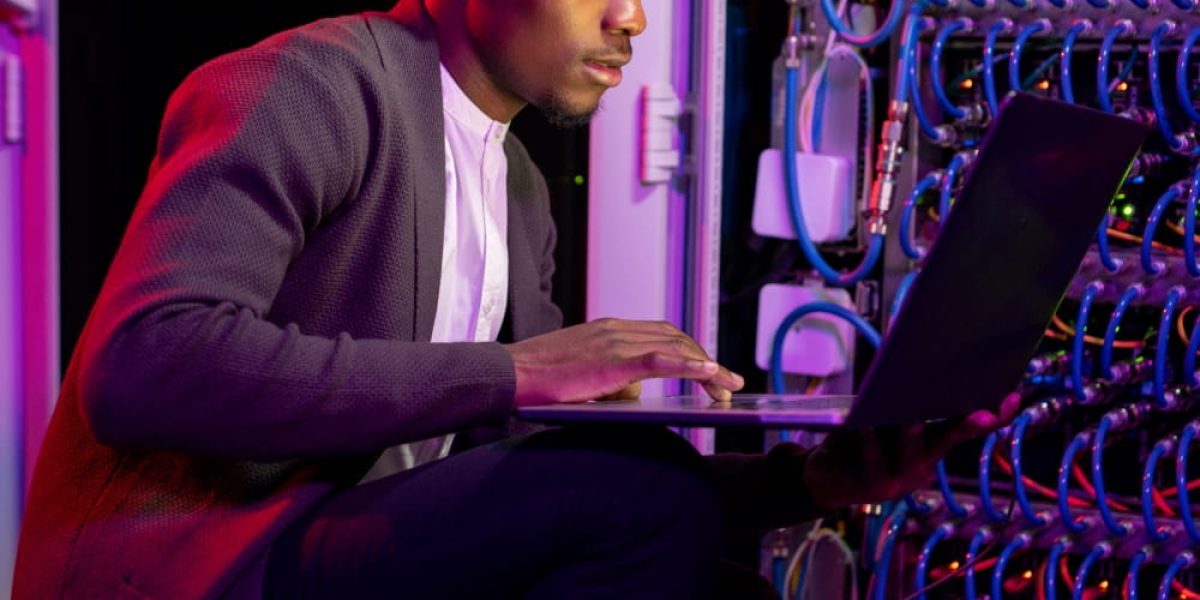 african-american-it-engineer-analyzing-work-of-ser-2023-11-27-04-54-12-utc-min.jpg