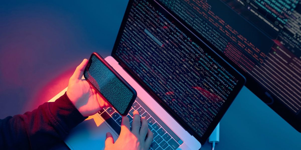 man-using-computer-and-programming-to-break-code-2023-11-27-05-30-55-utc-min.jpg